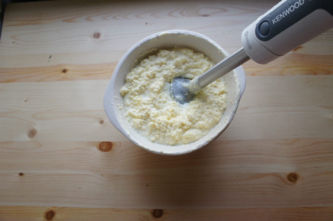 Step 2: Blend the curdled cream with a handheld mixer or blender until the butter separates