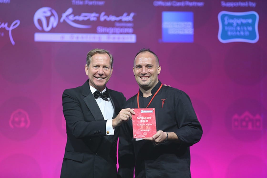 Chef Christophe Lerouy accepting the award at the 2016 Michelin Guide Singapore Gala Event