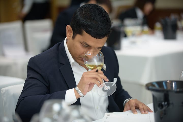 Fazil during the blind wine tasting competition. 