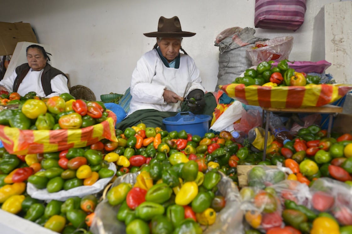 A market stall selling vibrant chillies in Peru.