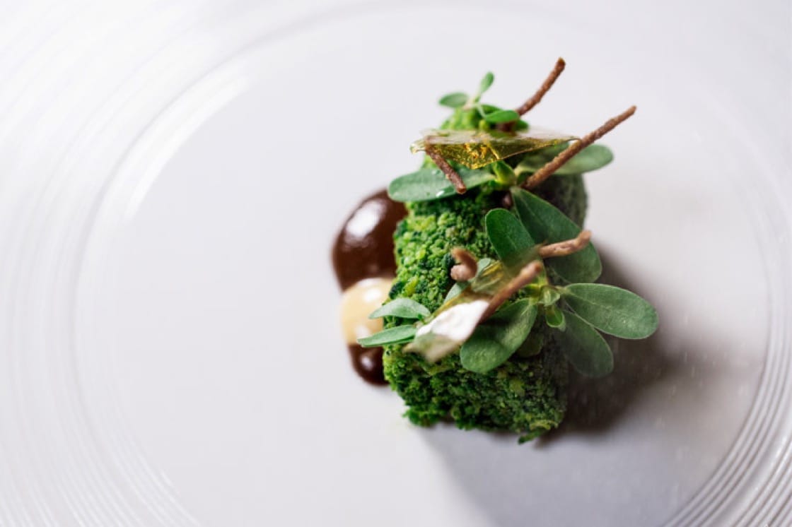 Aubergine braised in a mushroom stock, jackfruit seeds, black bean sauce and garlic emulsion from Dewakan