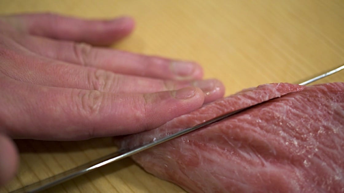 Pressure is key when it comes to slicing fish perfectly