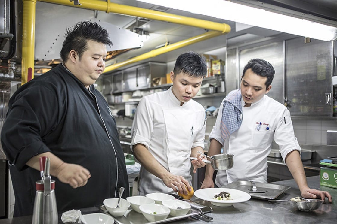 Chef Jason Tan of one-Michelin-starred Corner House prepares his dish of smoked Patagonian toothfish with celeriac remoulade, Alsatian bacon and Manjimup black truffle.