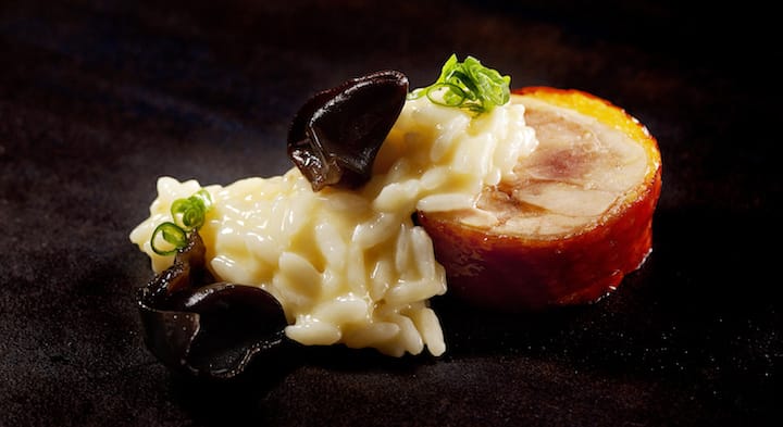 One of chef Alvin Leung's creations, Organic “long jiang” chicken, with aged acquerello rice, wooden fungus and sand ginger.