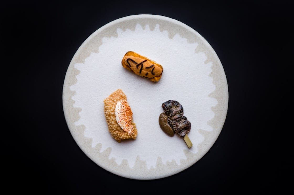 Grilled duck hearts, burnt onion mustard, smoked salt uni toast, fermented pumpkin powder.