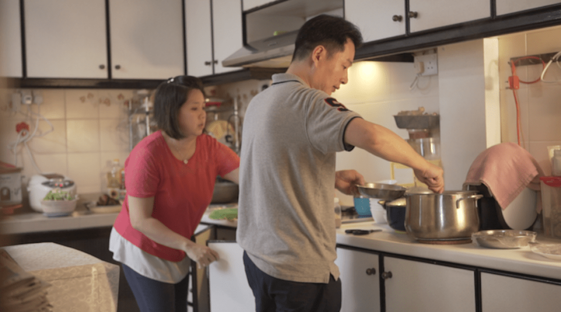 Chef Liu and his wife prepare the food for their second round of reunion dinner on Chinese New Year's Eve. 