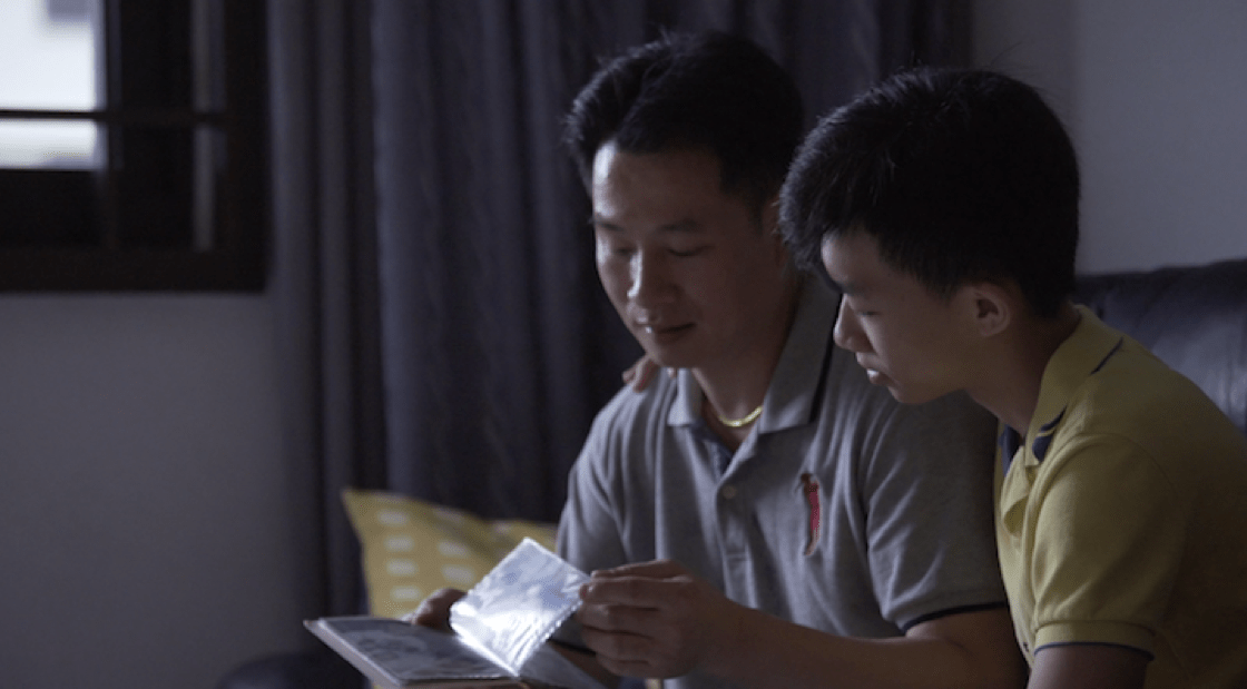 Chef Liu shares a tender moment with his younger son, Nicholas. 