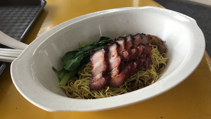 Chef Kang's signature char siew tops the wonton noodles at this Bib Gourmand establishment (Pic: MICHELIN Guide Digital)