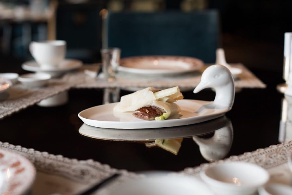 Three Michelin-star Le Palais' signature Flaming Duck is a Cantonese style roast duck. (Photo: Palais de Chine Hotel) 