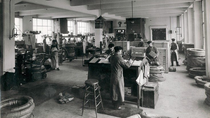 One of the tyre-fitting workshops at Michelin House, circa 1912
