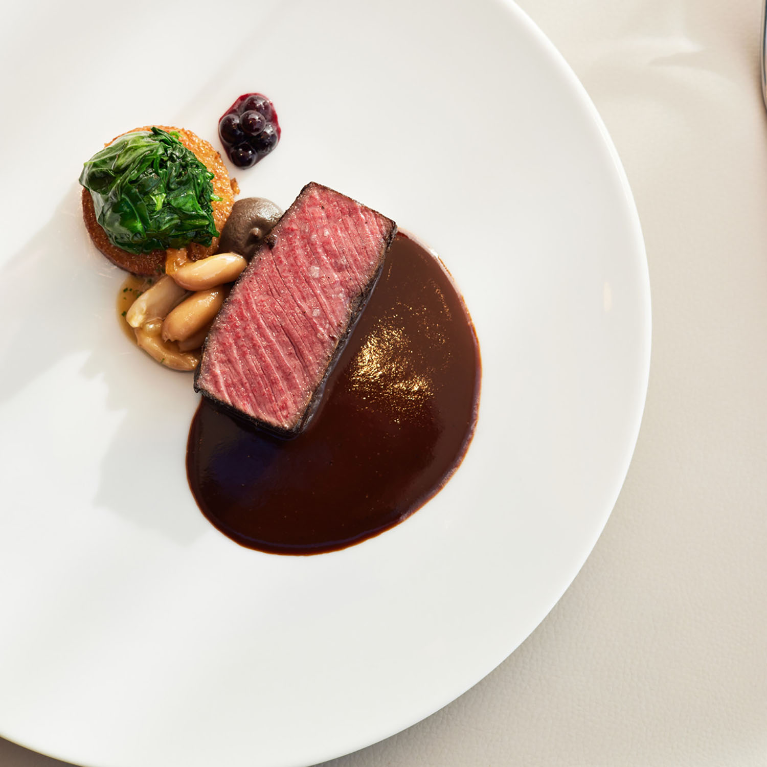 Venison from Engaru Town with Braised Peanuts and "Sauce au Poivre" (Photo: SÉZANNE)