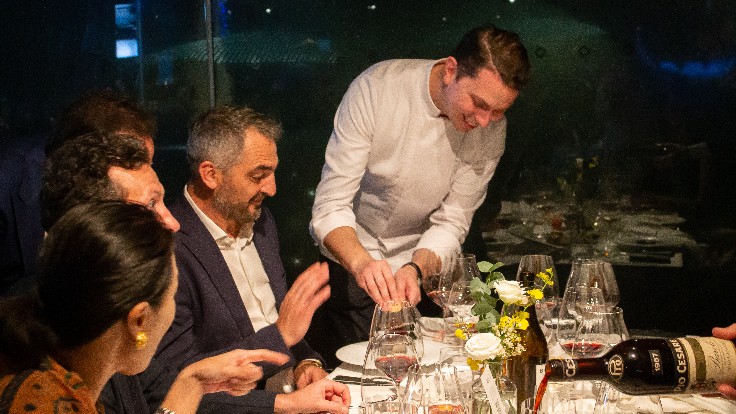 Daniele Sperindio shaving truffles for a guest at the Alba White Truffle Benefit Dinner and Charity Auction held at Art di Daniele Sperindio