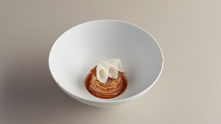 The dish in Meta that Kim says best represents himself is the Bibimmyeon because of his roots growing up in Busan and Seoul.