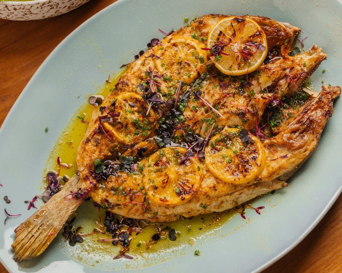 ryba's grilled fish marinated with fresh herbs and lemon. Image credit: Mohamed Gamil Alhajjaji/ryba