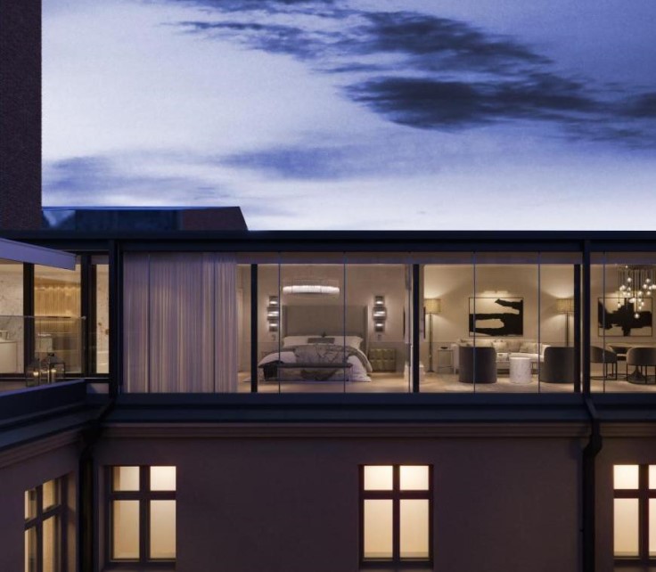 The Hotel Maria's sleek, modern design with floor-to-ceiling bedroom windows. © The Hotel Maria