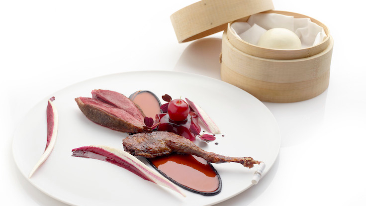 Cooking with a sense of place translates to signature dishes at Odette such as the Kampot Pepper Crusted Pigeon.