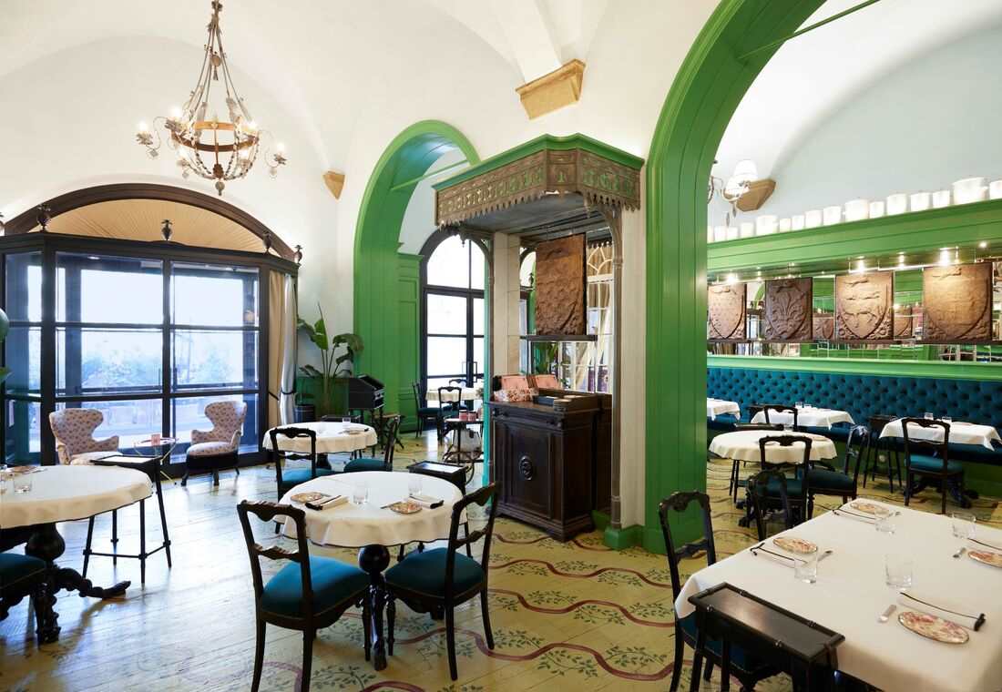 Guccia Osteria restaurant with its iconic green arches in Florence. © Gucci Osteria da Massimo Bottura